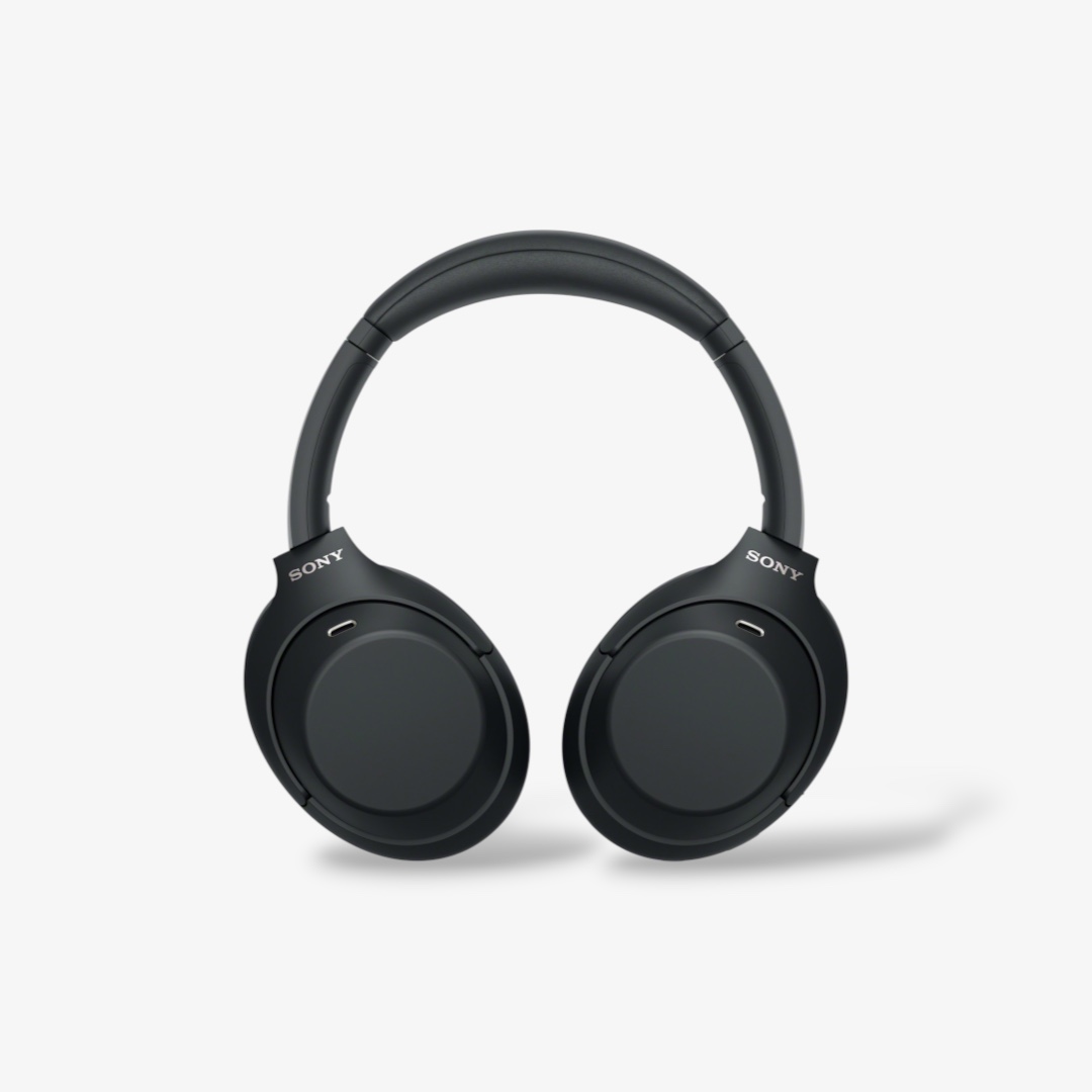 Black over-ear headphones on a white studio background
